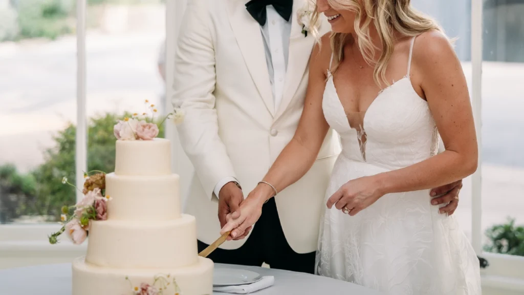 wedding cake cutting at The Allan House